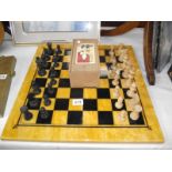 A large chess set (black queen missing)