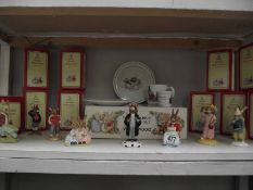 10 boxed Royal Doulton Bunnykin figures and a Wedgwood Peter Rabbit boxed nursery set