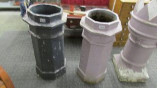 A pair of old chimney pots.