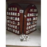 A thimble stand and 70+ thimbles