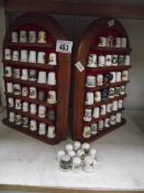 A thimble stand and 70+ thimbles