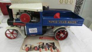 A boxed Mamod steam wagon.