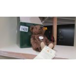 A boxed Steiff 'Historic Miniatures' bear.