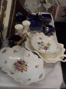 A quantity of silverplate dishes with blue liners,