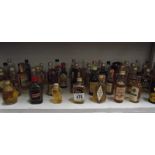 50+ miniature bottles of whisky,