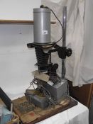 A vintage photograph enlarger.