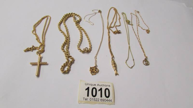 6 gold chains (4 with pendants), 23 grams (re-entered due to non paying bidder).