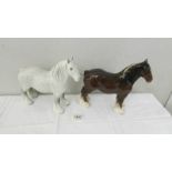 A Beswick grey shire horse and a Beswick brown shire horse.