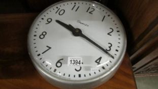 A Simplex wall clock.