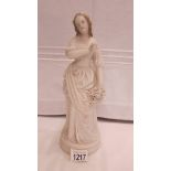 A 19th century Parian figure of a bride.