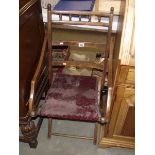 An early 20th century folding campaign chair.