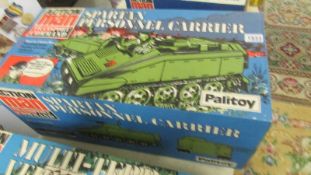 A boxed Palitoy action Man sparton personnel carrier.