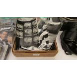 A box of vintage photographic contact sheets and negatives relating to knitware design and some