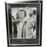 Steve McQueen - a fine framed picture of Steve McQueen from Le Mans written below and signed