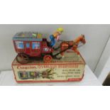 A boxed tinplate ICHIDA Japan Cragston Overland Stagecoach, battery operated.