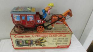A boxed tinplate ICHIDA Japan Cragston Overland Stagecoach, battery operated.