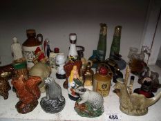 5 Beswick animal shaped miniature whisky bottles and other miniatures.