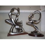 2 reproduction art deco style figures.