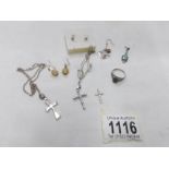 A mixed lot of jewellery including cross pendants, earrings etc.