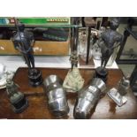 A quantity of Knights in armour figures including lighters and a pair of gauntlets etc.