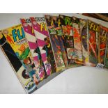 A quantity of Flash comics