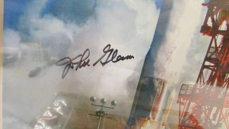 A signed photograph of astronaut John Glenn and Trip to the Moon publication. - Image 2 of 3