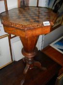 A Victorian inlaid sewing table.