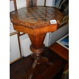 A Victorian inlaid sewing table.