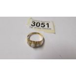 An 18ct gold ring set 3 opals, size P, total weight 1.8 grams.