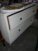 A painted 2 drawer chest.