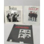 Three Vinyl LP records being The Beatles First US visit,