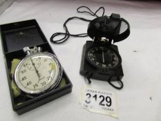 A Russian stop watch and a compass.