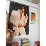 An Elvis poster and an Elvis 1981 calendar.