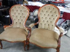 A good pair of deep buttoned spoon back Grandmother and Grandfather chair.