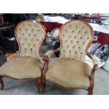 A good pair of deep buttoned spoon back Grandmother and Grandfather chair.