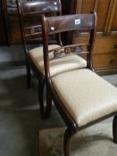 A pair of Victorian mahogany bedroom chairs.