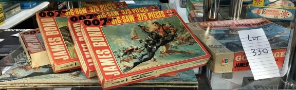 4 boxed 007 James Bond jigsaws, ,