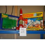 A shelf of Thunderbird items including 3D painting set etc.