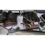 2 pairs of good Carl Zeiss binoculars.