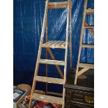 A wooden step ladder.