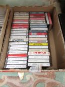 Approximately 40 Beatles cassette tapes.