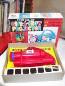 A Chad valley give-a-show projector complete in box