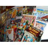 A quantity of comics including Action & Metalman etc.