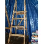 A wooden step ladder.