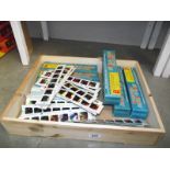 A large quantity of Chad valley give-a-show slides and quantity of boxes (empty)