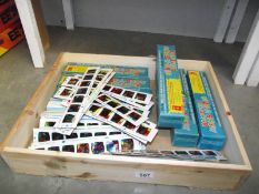 A large quantity of Chad valley give-a-show slides and quantity of boxes (empty)