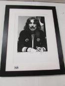 A framed limited edition photograph of George Harrison, 52/500.