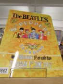 A metal Beatles poster.