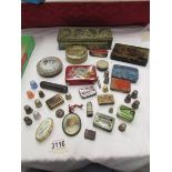 A mixed lot of old tins, thimbles etc.