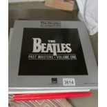 6 Beatles CD boxed sets.